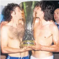  ?? ?? TALK OF TOWN John Wark and Paul Mariner kissing trophy