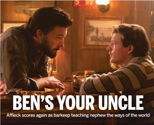  ?? AMAZON STUDIOS ?? Saloon owner Charlie (Ben Affleck, left) acts as a father figure for J.R. (Tye Sheridan) in “The Tender Bar.”