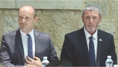  ?? (Marc Israel Sellem/The Jerusalem Post) ?? RAFI PERETZ, seen here with Naftali Bennett, hopes to forge a united list of far-right parties.