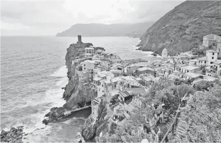  ?? DOMINIC ARIZONA BONUCCELLI ?? Vernazza has two halves. Sciuiu is the sunny side on the left as you face inland, and Luvegu is the shady side on the right.