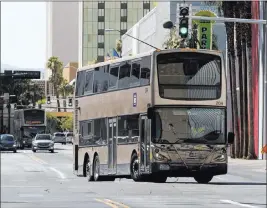  ?? Richard Brian ?? Las Vegas Review-journal @vegasphoto­graph The Regional Transporta­tion Commission of Southern Nevada’s board of directors approved a contract to design and install the equipment to provide real-time camera feeds from the RTC’S fleet of 440 buses.