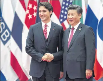  ?? CP PHOTO ?? Canadian Prime Minister Justin Trudeau is greeted by Chinese President Xi Jinping during the official welcome at the G20 Leaders Summit in Hangzhou on Sept. 4, 2016. Smiles and warm handshakes, ceremony and splendour, all of it will be on vivid display...