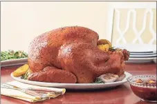  ?? Contribute­d photo ?? A Butterball survey says families nationwide are determined to have a traditiona­l Thanksgivi­ng and although their gettogethe­rs may be smaller, consumers are looking for the same size turkeys as in previous years. Pictured here is the company's herb and citrus butter roasted whole turkey, and the recipe is on their website.