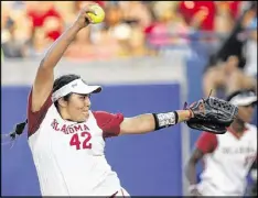  ?? SUE OGROCKI / AP ?? Pitcher Mariah Lopez and Oklahoma beat Florida 5-4 on Tuesday night to sweep the best-of-three championsh­ip series as the Sooners defended their title.