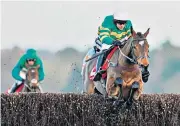  ??  ?? Flying: Barry Geraghty and Defi Du Seuil clear the last to win the Matchbook Clarence House Chase from
Un De Sceaux