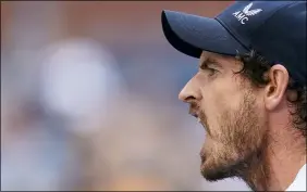  ?? SETH WENIG — THE ASSOCIATED PRESS ?? Andy Murray reacts after scoring a point against Stefanos Tsitsipas during the first round of the U.S. Open on Aug. 30.