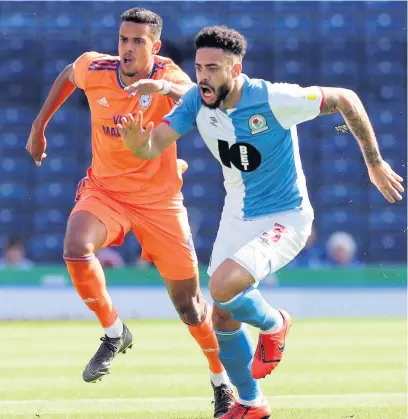  ??  ?? Blackburn Rovers defender Derrick Williams, right, in action against Cardiff City last season