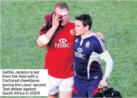  ??  ?? Gethin Jenkins is led from the field with a fractured cheekbone during the Lions’ second Test defeat against South Africa in 2009