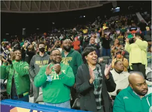  ?? STEPHEN M. KATZ/STAFF ?? Norfolk State fans cheer for the Spartans during the 2022 MEAC Tournament championsh­ip game at Scope. The league and city of Norfolk announced Tuesday that the men’s and women’s basketball tournament­s will stay in Norfolk through at least 2027.