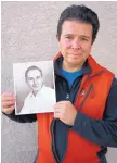  ?? TANIA ORTIZ/ASSOCIATED PRESS ?? Reuben Ortiz, holding a photo of the Rev. Jerome Coyle, says he learned that Coyle, who had been living at his Albuquerqu­e home until recently, admitted that he sexually abused boys.