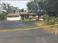  ?? EVAN BRANDT — MEDIANEWS GROUP ?? Police tape closes off the scene of a double fatal shooting at this home in the 2900 block of Reifsnyder Road in New Hanover.