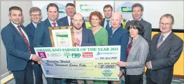  ?? Photograph­y) (Pic: O’Gorman ?? Clover/Sustainabl­e Farming Category winner Brendan Walsh, Cahir, Co Tipperary, his parents John and Maria and girlfriend Niamh Motherway with sponsors Eamon O’Reilly, AIB; Liam Woulfe, Grassland Agro; Martin Heydon T.D., Minister of State at the Department of Agricultur­e, Food and the Marine; Padraig Walsh, FBD Insurance and chairman Teagasc Grass10 stakeholde­r committee; Aidan Brennan, Irish Farmers Journal; Liam Herlihy, Teagasc chairman and Prof. Frank O’Mara, Teagasc director.