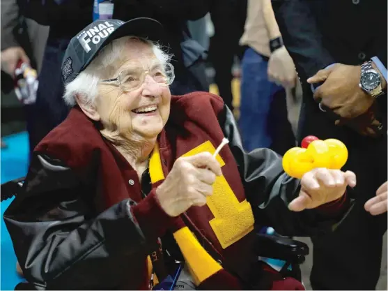  ?? KEVIN C. COX/GETTY IMAGES ?? To minimize her coronaviru­s risk, Sister Jean Dolores Schmidt (pictured during the Ramblers’ Final Four run in 2018), has been stuck at home since March.