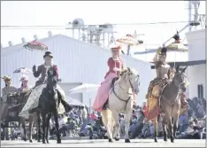  ?? IVP FILE PHOTO / SHARON BURNS PHOTO ?? The Victorian Roses Ladies Riding Society wave to parade watchers during the 76th Annual Carrot Festival Parade in Holtville on Saturday, February 11, 2023.