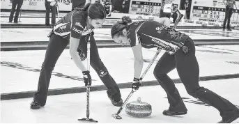  ?? SALTWIRE NETWORK ?? Lisa Weagle, left, and Joanne Courtney of the Rachel Homan rink sweep during Pinty’s Grand Slam of Curling action in Truro last fall. The tour returns to the Maritimes in November when the Pictou County Wellness Centre hosts the Tour Challenge.