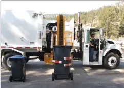  ?? Daily Courier file photo ?? Too many people are putting non-recyclable­s in the blue carts, regional officials say.