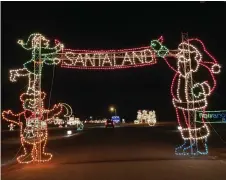  ?? (Pine Bluff Commercial file photo/Byron Tate) ?? The Enchanted Land of Legends and Lights features almost a million lights as seen in this 2020 file photo. The light trail has struggled with electrical infrastruc­ture problems causing a delay in its opening.