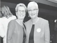  ??  ?? Kathleen Wynne and Jane Rounthwait­e.