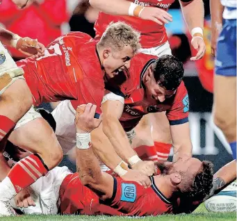  ?? EPA ?? MUNSTER’S RG Snyman, bottom, seen here celebratin­g scoring against the Stormers in 2021, is in the touring squad to play the Cape-based side in the URC final this weekend.