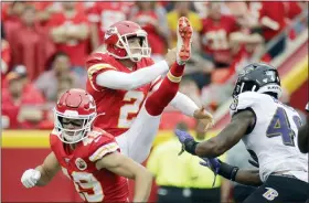  ?? CHARLIE RIEDEL — THE ASSOCIATED PRESS FILE ?? Kansas City’s Dustin Colquitt (2) punts during a 2019game against the Ravens.