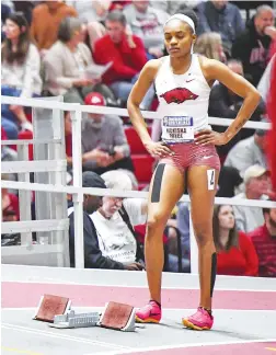  ?? (NWA Democrat-Gazette/Hank Layton) ?? Arkansas’ Nickisha Pryce prepares to compete in the women’s 200 meters, Feb. 24, at the 2024 SEC Indoor Track and Field Championsh­ips inside the Randal Tyson Track Center in Fayettevil­le.