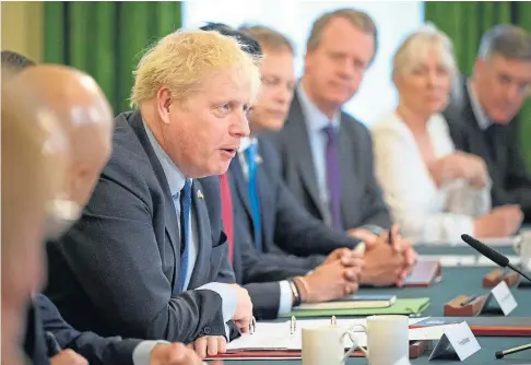  ?? ?? BUSINESS AS USUAL: Boris Johnson chairs a Cabinet meeting at 10 Downing Street yesterday.