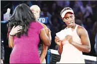  ?? (AP) ?? In this Sept 9, 2017, file photo, Sloane Stephens, of the United States, reacts after receiving the winner’s award check after beating Madison Keys, of the United States, in the women’s singles final
at the US Open tennis tournament in New York.