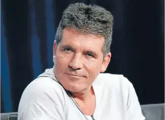  ?? Photo: REUTERS ?? Ready for kids? Simon Cowell himself concedes he is ‘‘very odd’’. He is said to get up at noon, watch cartoons for an hour in the bath, then work until 5am.