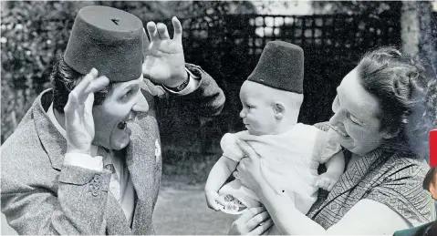  ??  ?? Tommy, right, in trademark fez and, above, the comedian entertains his new daughter, Vicky, with wife Gwen