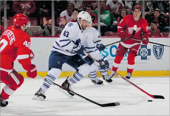  ?? — GETTY IMAGES FILES ?? Toronto Maple Leafs forward Nazem Kadri, centre, says he doesn’t go into games aiming to draw the opposition into penalties. He just wants to score goals and create scoring chances. Kadri has drawn 49 penalties this season, tops in the NHL.