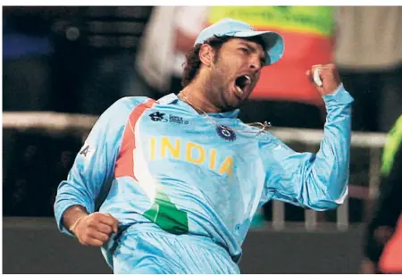  ?? ?? Lionheart: Yuvraj Singh celebrates the dismissal of Australia’s Michael Hussey during the semifinal. Yuvraj’s 30-ball 70 had made the difference in a nail-biting affair.ap