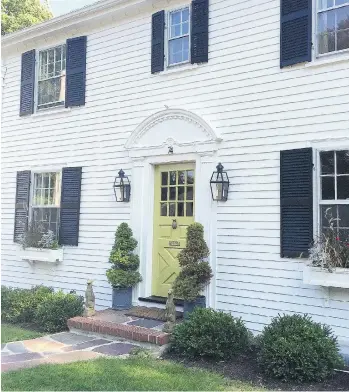  ?? ERIN GATES ?? The front door of designer Erin Gates’ home in Newton, Mass., is painted Wasabi by Benjamin Moore.