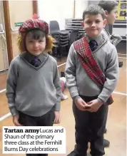  ??  ?? Tartan army Lucas and Shaun of the primary three class at the Fernhill Burns Day celebratio­ns