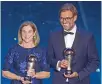  ?? — AFP ?? USA head coach Jill Ellis (left) and Liverpool coach Jurgen Klopp after winning the Fifa Best Coach of the Year trophies in Milan on Monday.