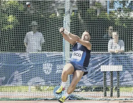  ??  ?? 2 Scotland captain Mark Dry in action on his way to victory in the hammer event at the Loughborou­gh Internatio­nal.