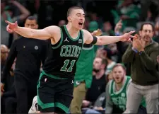  ?? MATT STONE — BOSTON HERALD ?? Celtics guard Payton Pritchard celebrates his 3-pointer during the first half of Boston’s win over the Bucks at the TD Garden.