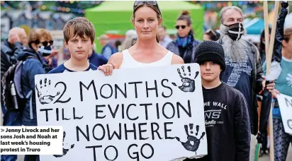  ??  ?? Jenny Livock and her sons Josh and Noah at last week’s housing protest in Truro