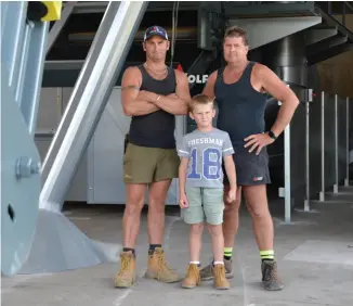  ??  ?? ABOVE / Three generation­s. Matt, Andy and Matthew Drummond of The Pines at Riwaka with their new hop picker. The Pines won New Zealand Hop Ltd's 2019 Hop Farm of the Year Award.