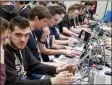  ?? The Associated Press ?? Hackers take part in a test at the Cybersecur­ity Conference in Lille, northern France.