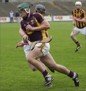  ??  ?? The late Jack Pettit playing for Wexford against Kilkenny in the 2015 Minor Hurling championsh­ip.