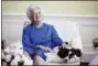  ?? DOUG MILLS — THE ASSOCIATED PRESS FILE ?? In this 1990 file photo, first lady Barbara Bush poses with her dog Millie in Washington. A family spokesman said Tuesday that former first lady Barbara Bush has died at the age of 92.