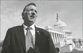  ?? J. SCOTT APPLEWHITE/AP ?? Rep. Paul Gosar, R-Ariz., waits for a news conference about the Delta variant of COVID-19 and the origin of the virus, at the Capitol in Washington on July 22. Gosar is facing criticism after he tweeted a video that included altered animation showing him striking congresswo­man Alexandria Ocasio-Cortez with a sword. In a tweet Monday night, Ocasio-Cortez said Gosar “shared a fantasy video of him killing me.”