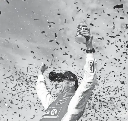  ?? MATT SULLIVAN/GETTY IMAGES ?? Matt Kenseth celebrates in victory lane last Sunday after winning the Monster Energy NASCAR Cup Series Can-Am 500.