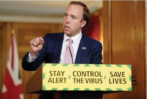  ?? File/reuters ?? Health Secretary Matt Hancock speaks during a daily briefing to update on the coronaviru­s disease outbreak at 10 Downing Street in London, Britain, at the weekend.