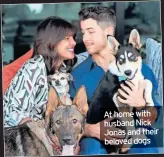  ??  ?? At home with husband Nick Jonas and their beloved dogs