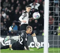  ??  ?? LAWMAN Derby’s Tom Lawrence scores his side’s second