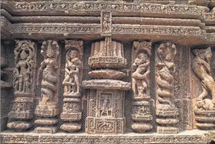  ?? TYLER/GETTY IMAGES ?? Carvings on the facade of the mid13th century Konark temple in Odisha. Vikramajit Ram’s epic is set in the same period. LEISA