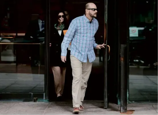  ?? JESSICA RINALDI/GLOBE STAFF ?? Jack Michael Teixeira (front) and Dawn Dufault left the courthouse Monday after their son, Jack Teixeira, pleaded guilty.