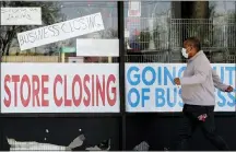  ?? NAM Y. HUH — THE ASSOCIATED PRESS ?? A store in Niles, Ill., is among the widespread business closures triggered by the pandemic. U.S. businesses shed 2.76million jobs in May, as the economic damage from the historical­ly unrivaled outbreak stretched into a third month.