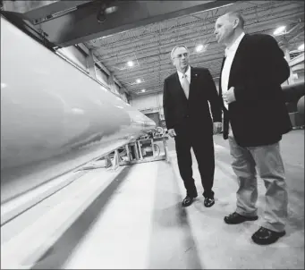  ?? MARK BLINCH/ REUTERS ?? Joe Oliver, left, asked officials for briefings so he could speak knowledgea­bly about his natural resources portfolio.